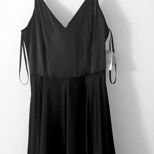 Brand New, NEVER WORN. black dress with pockets